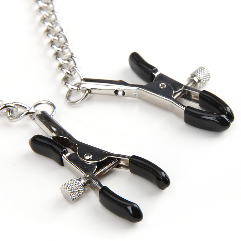 Pair of black and silver clamps on a chain against a white background