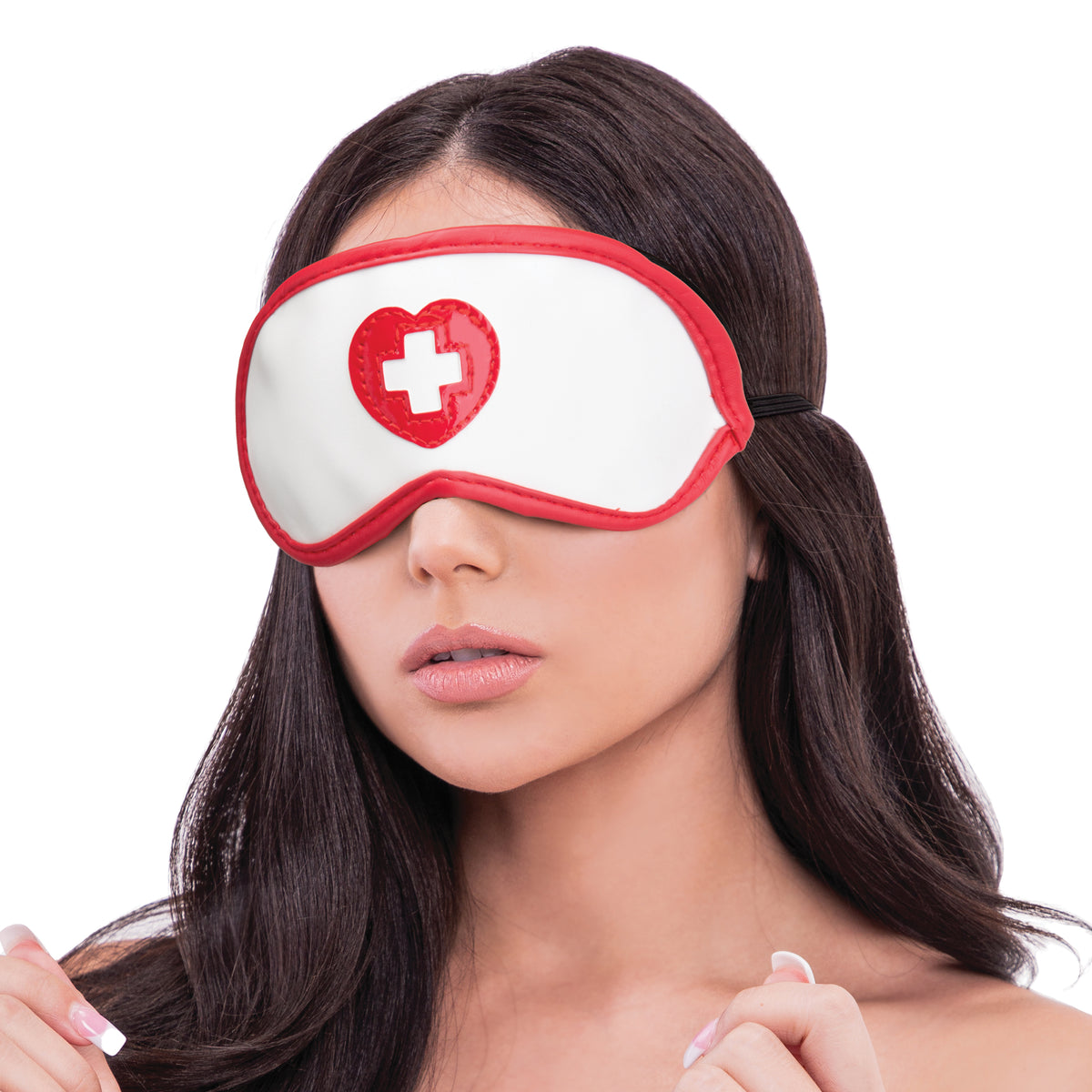 Woman wearing a sleep mask with a red cross design on a white background