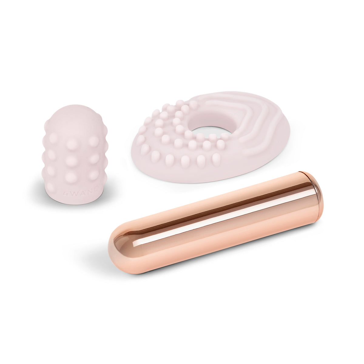 Set of three pink silicone products on a white background