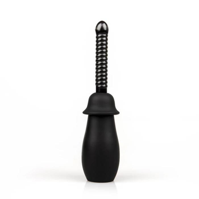 A black enema bulb syringe kit is displayed on a white background. It includes a soft, squeezable bulb and three interchangeable  nozzles. From left to right, the nozzles are: one with a ribbed texture, one that is smooth and tapered, and one that is smooth with a curved tip.